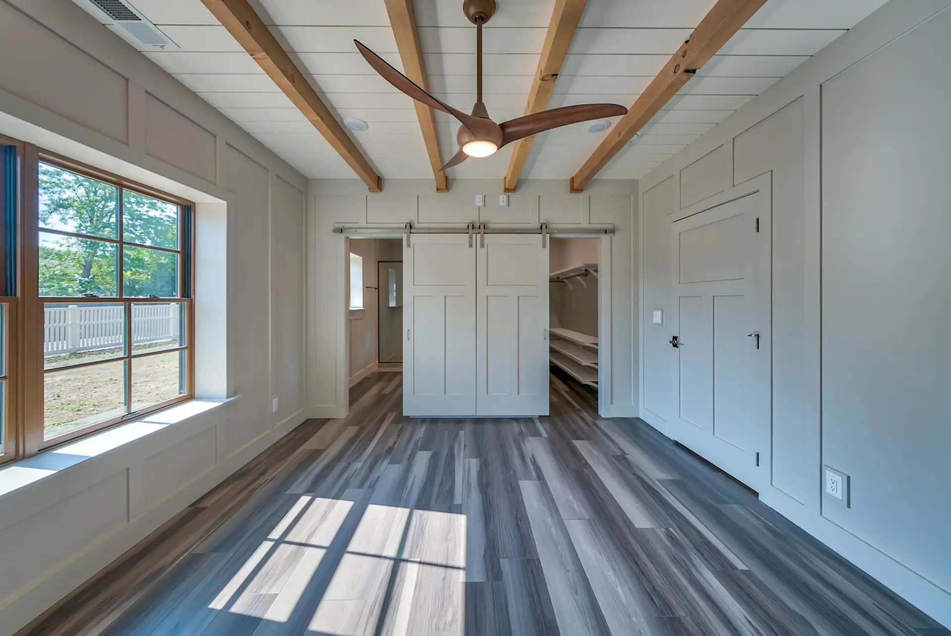 Master bedroom with ceiling fan at 815 N Clark in Powell Wyoming built by Harvell Homes